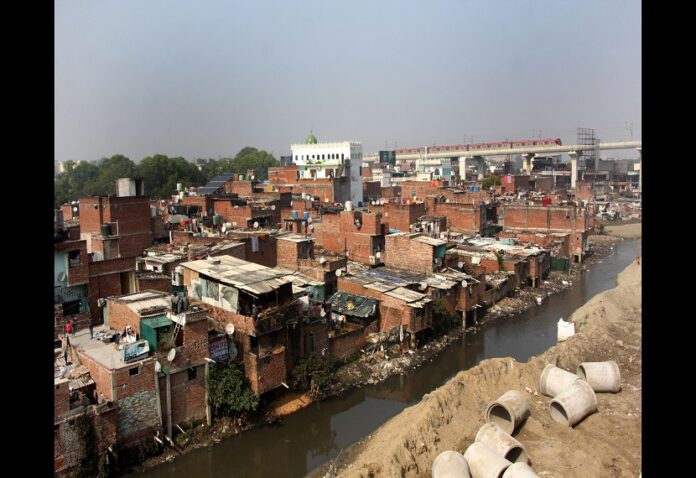 Houses built on the banks of Kukrail river will not be demolished, people celebrated by playing drums.