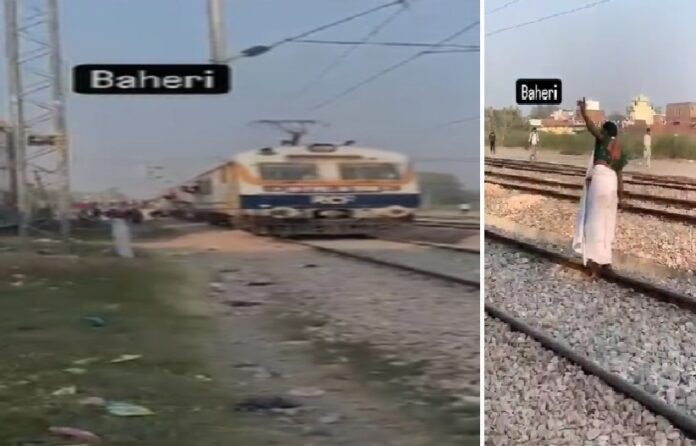 Woman stopped train by standing on the track in Bareilly, people made video and went viral