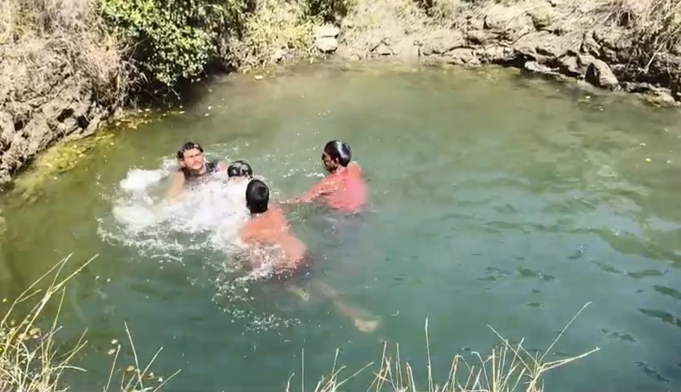 A woman in Madhya Pradesh hanged herself after killing her four daughters, creating panic in the village.