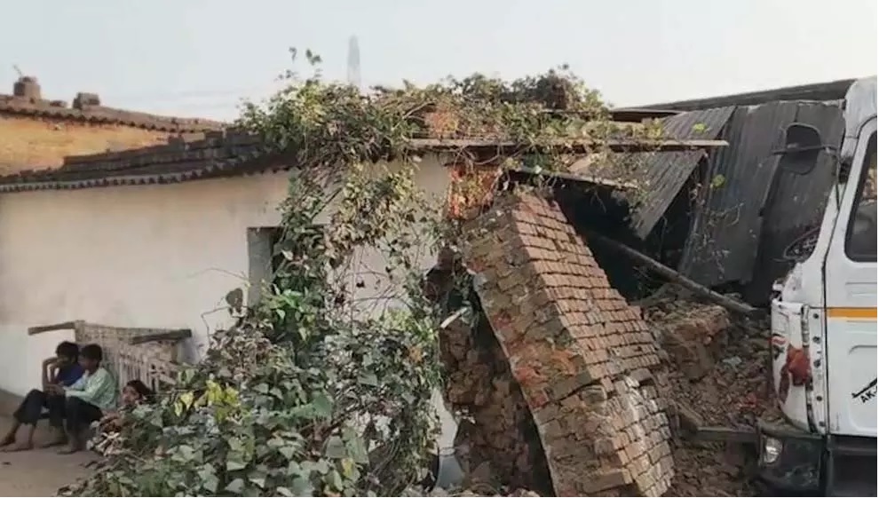 In Ghazipur, an uncontrolled trailer rammed into a house, killing a woman; villagers blocked the road.