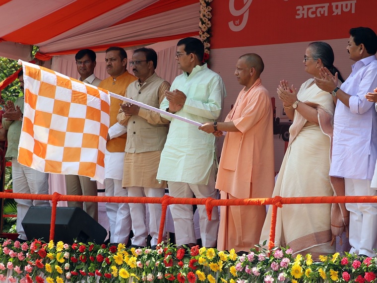 CM Yogi flags off 250 electric and CNG vehicles.