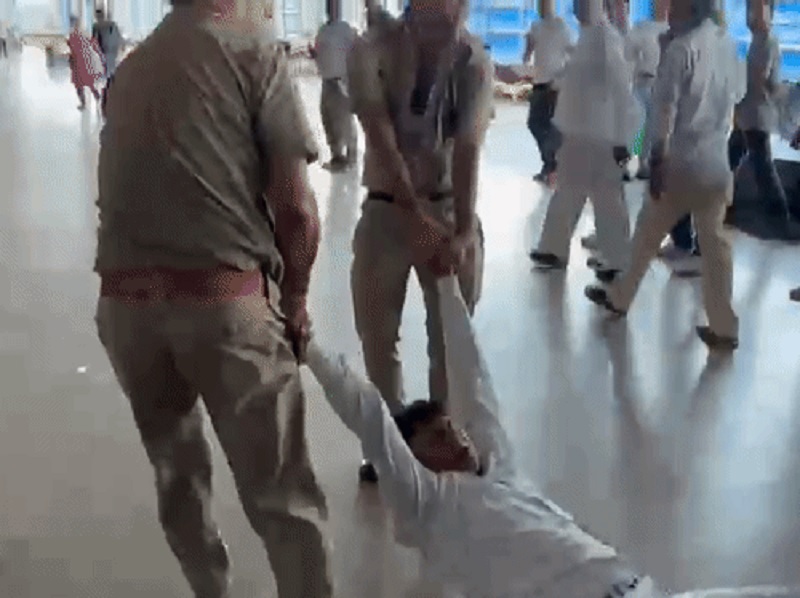 RPF personnel dragged a railway official at the station and slapped him for having a train stopped.